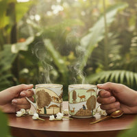 Two hands holding steaming cups with nature-themed designs against a blurred green background.
