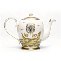 Decorative teapot with intricate 24 carat gold and teal & blue patterns on a white background