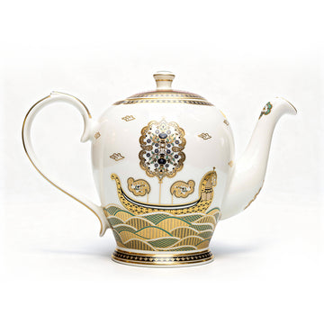Decorative teapot with intricate 24 carat gold and teal & blue patterns on a white background